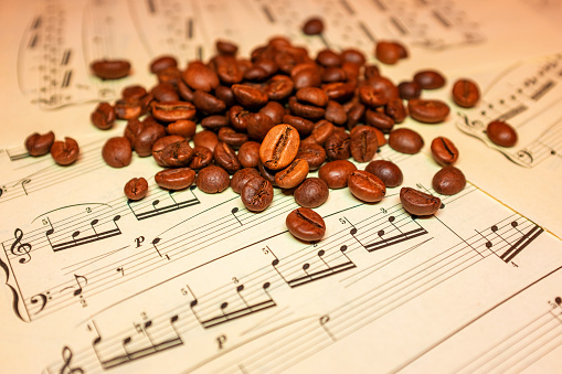 Coffee beans on the sheet music