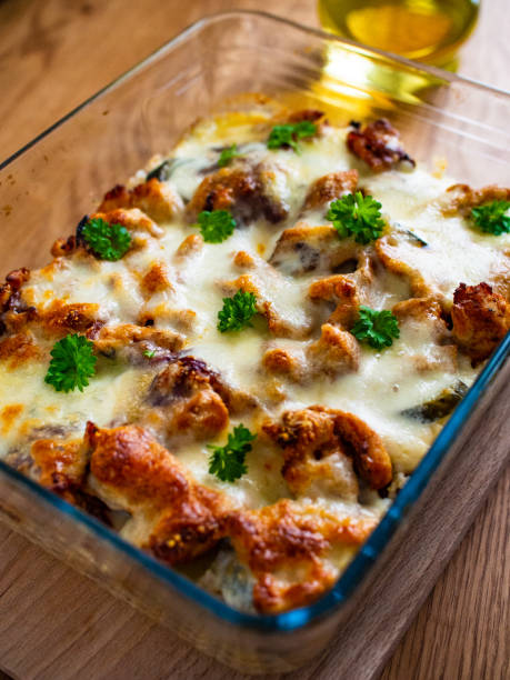 istock Rice casserole with barbecue chicken breast, cheese and vegetables 1236791318