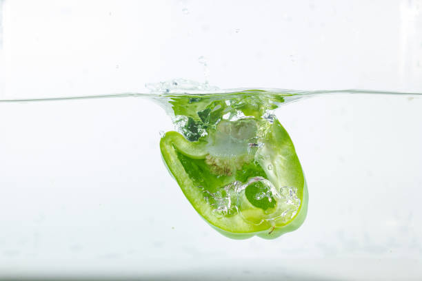 istock Sweet pepper in water splashes, green 1236802961