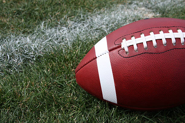 istock American Football on Grass 123684271