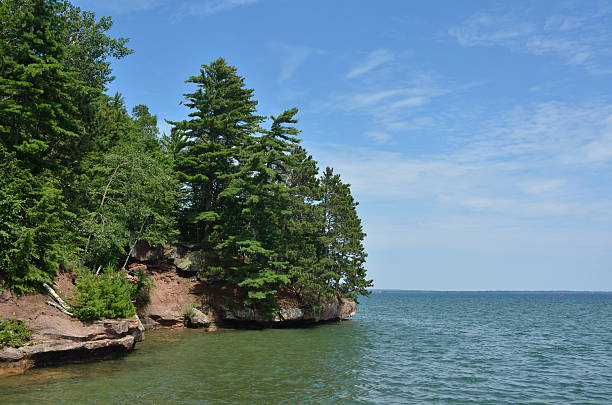 Scenic Rocky Shoreline on a Sunny Summer Day Scenic Rocky Shoreline of Houghton Point Near Washburn, Wisconin bayfield county stock pictures, royalty-free photos & images