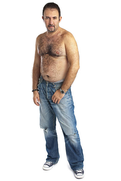 Standing Seminude Hairy Man Looking at Camera Bearded man on white background. fat guy no shirt stock pictures, royalty-free photos & images