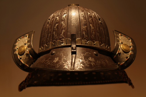 An ancient Asian metal helmet.