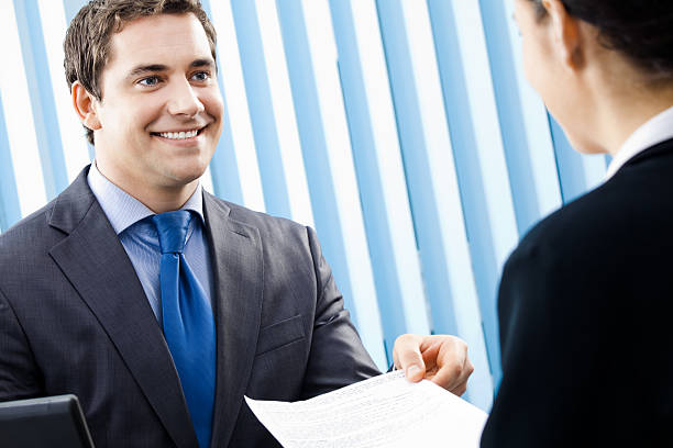 istock Two businesspeople at office 123690893