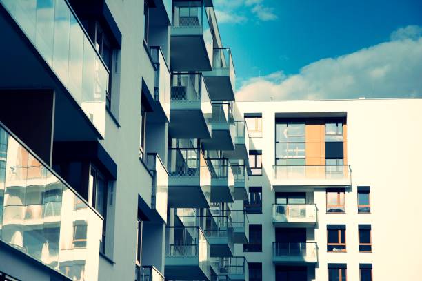 istock Modern apartment buildings on a sunny day with a blue sky. 1236932096