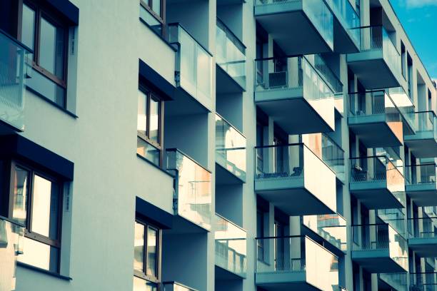 istock Modern apartment buildings on a sunny day with a blue sky. 1236932610