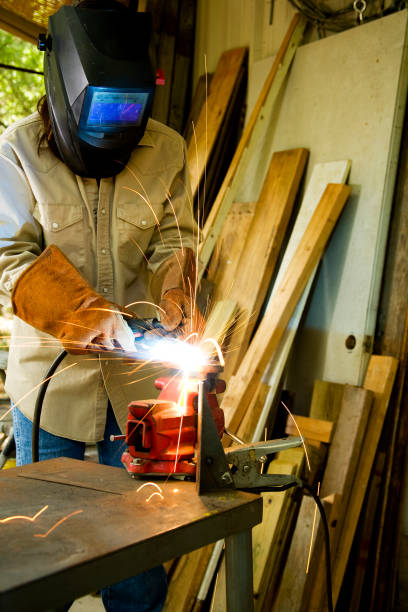 istock Woman welding. Blue collar, working class. Female construction worker. 123693718
