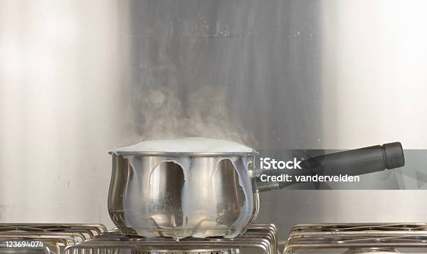 Saucepan Of Boiling Milk Stock Photo - Download Image Now - Overflowing, Milk, Boiling