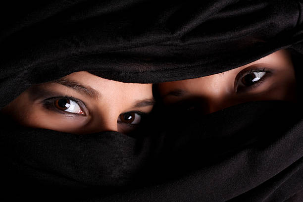 istock Two women under black religious veil 123695743