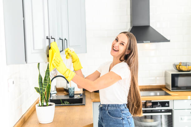 istock Young woman in rubber gloves doing house cleaning 1237007620