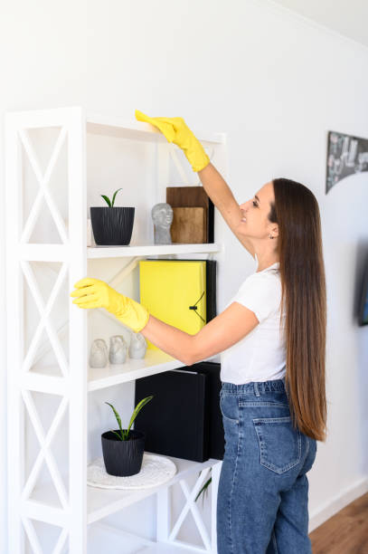 istock Young woman in rubber gloves doing house cleaning 1237008145