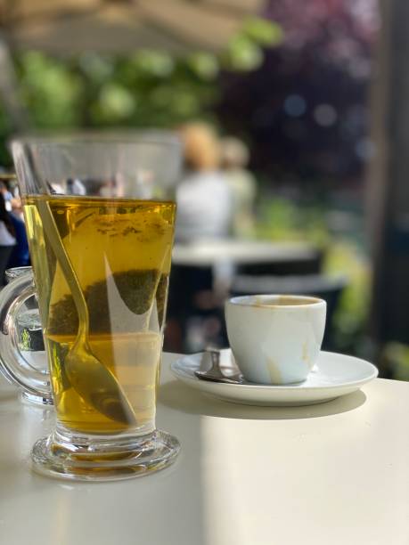 istock Close up of espresso coffee cup and green tea cup 1237045207