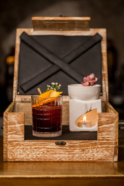 istock Classic old-fashioned cocktail with orange peel in the bar counter 1237101785