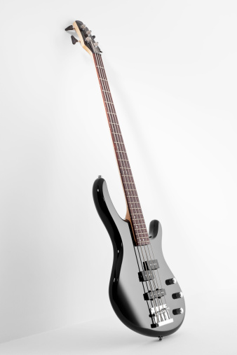 Bass guitar on white background