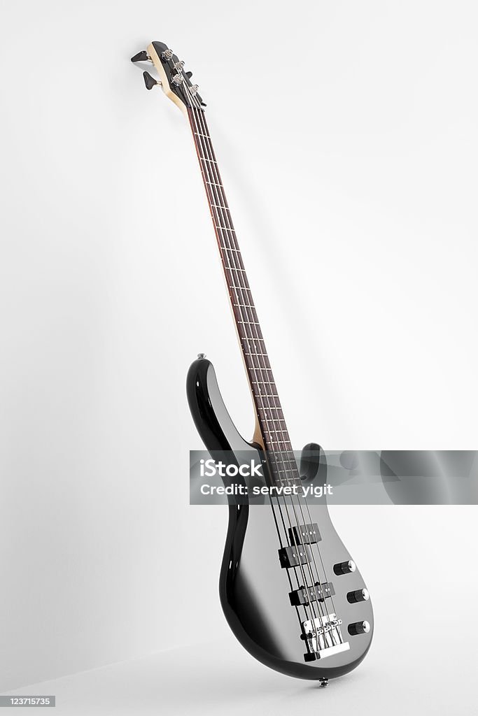 Bass guitar on white background Bass Guitar Stock Photo
