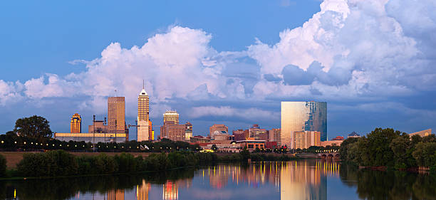 A beautiful panoramic shot of the Indianapolis skyline Panoramic image of Indianapolis skyline at sunset after thunderstorm. This is 5 vertical images stitched together in photoshop. indianapolis photos stock pictures, royalty-free photos & images