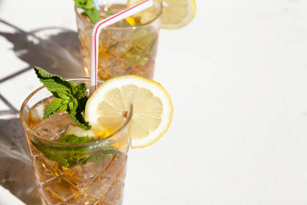 istock two iced tea glasses with peppermint, straw and lemon slice 1237240840