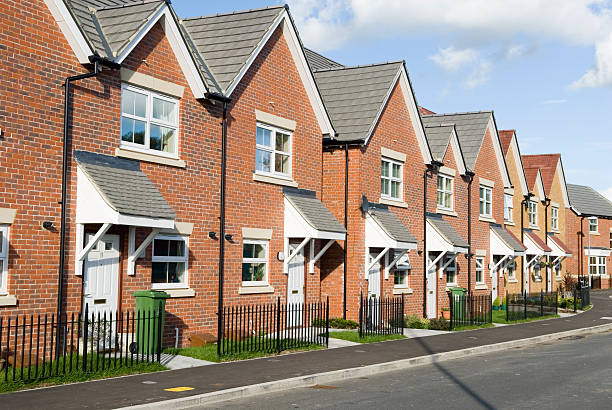 New Homes A row of new homes row house stock pictures, royalty-free photos & images