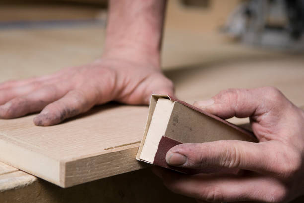 istock A man at work hand finishing wood 123727420