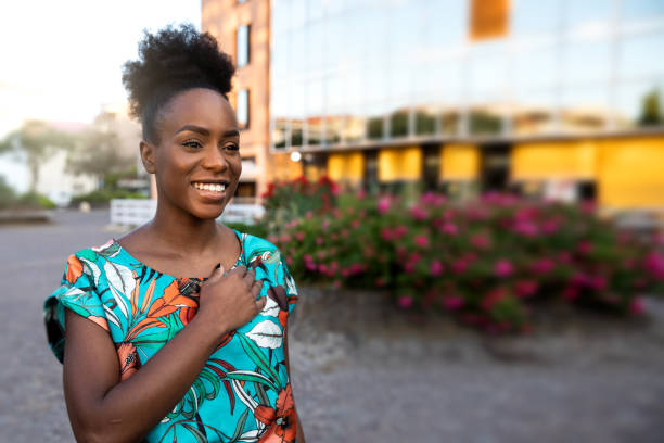 istock Woman waving to a friend avoiding handshake and hugs 1237294799