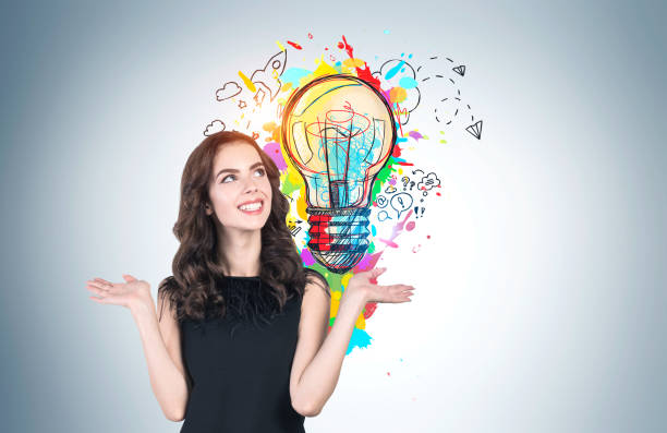 istock Smiling woman showing her business idea 1237298526