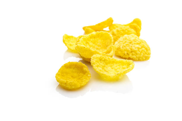 istock Cereal eat Healthy Superfood breakfast. Snack yellow Cornflakes isolated on white background. Antioxidant, omega-3, protein, mineral nutrients - vegetarian diet concept. 1237298529
