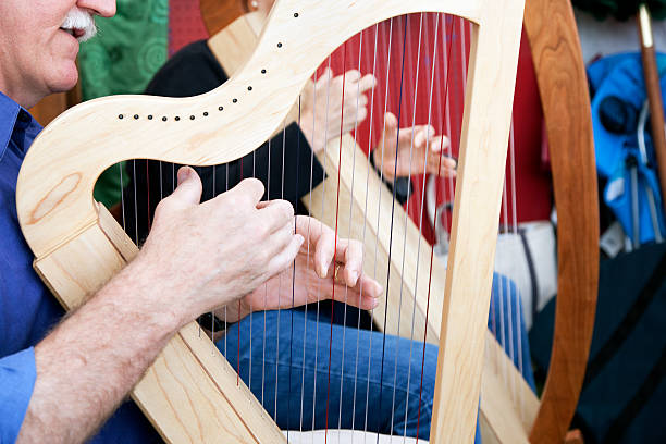 Playing Celtic Harp stock photo