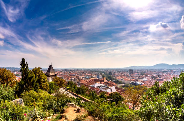 GRAZ, AUSTRIA - CIRCA AUGUST 2019: View on the famous Uhrturm on the Schlossberg circa August 2019 in Graz, Austria.