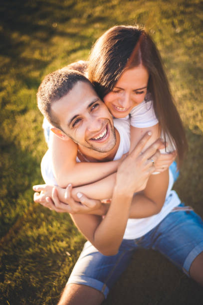 istock Young couple in love in nature 1237314835