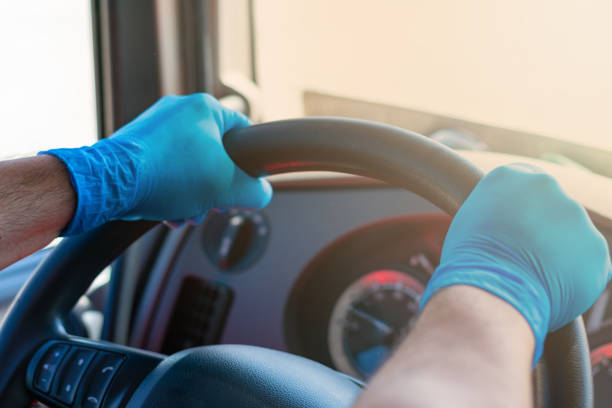 istock Trucker driving with latex gloves 1237316440