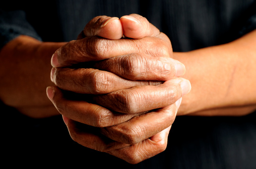 Clasping Hands of a Senior African American