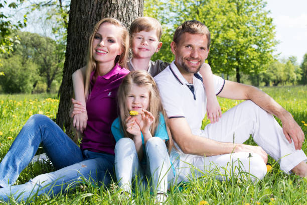 istock Family in spring park 1237329050