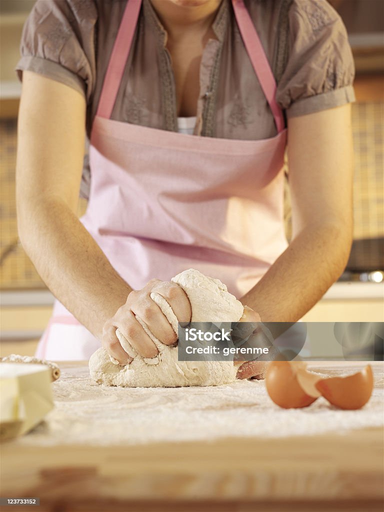 woman baking in kitchen Adult Stock Photo