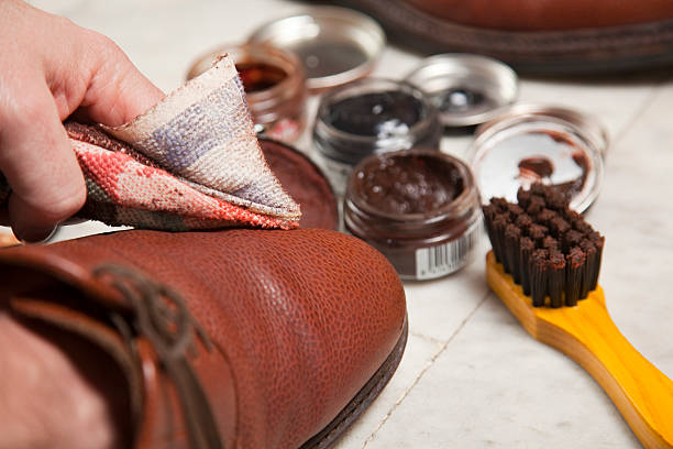 Shoe polishing Shoe polishing being done. Canon 5DMkII shoe polish photos stock pictures, royalty-free photos & images