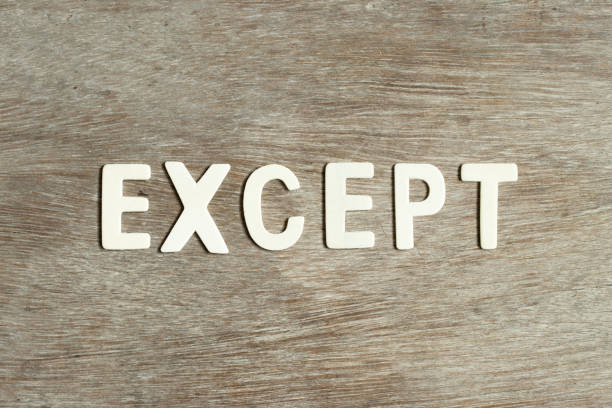 Alphabet letter in word except on wood background