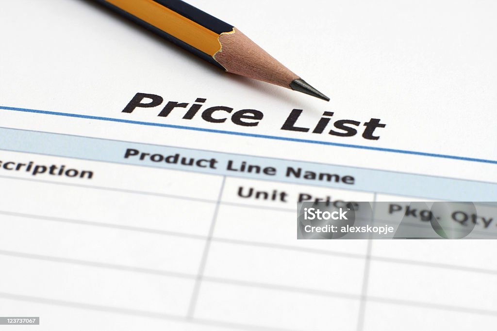 A price list sheet with a sharpened pencil on top Close up of pencil on price list Price Tag Stock Photo