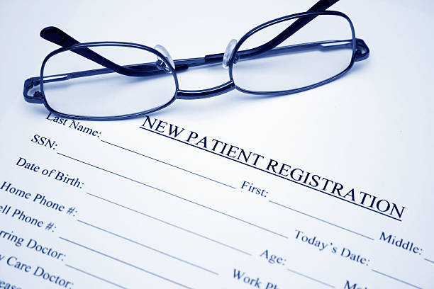 New patient registration stock photo