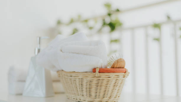 istock White towel with basket in bathroom 1237438579