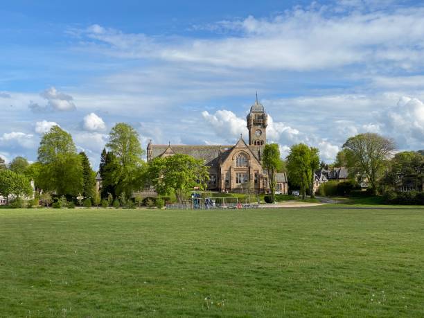 istock Quarriers Village view of church from empty play park 1237446413