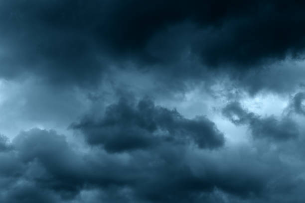 istock Stormy rain big fluffy clouds. Dark sky. Natural scenic abstract background. Weather changes backdrop. Sky filled with voluminous clouds. 1237467681
