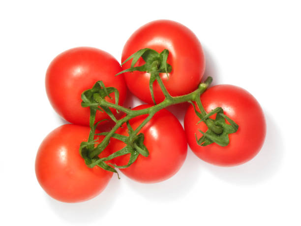 istock Tomato isolated on white background. Bunch of fresh tomatoes 1237474732