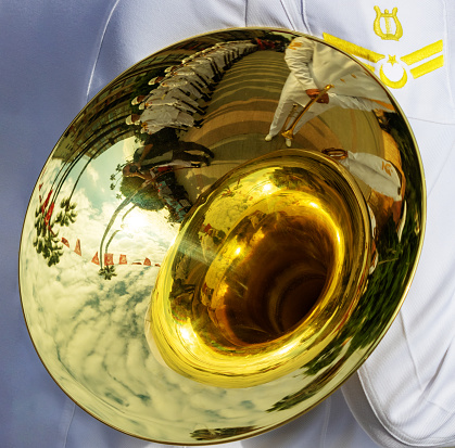 Musical Instrument of Tuba's  Reflections: Background of the military band.