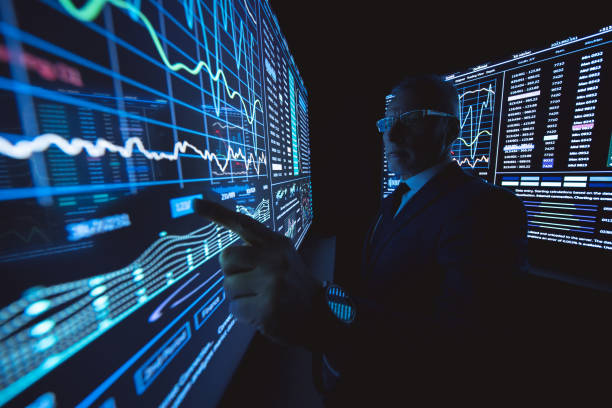 istock The man working on the big sensor display in the dark lab 1237516616