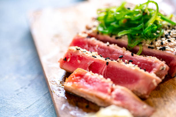 Raw Tuna Steak with ingredients ready to eat