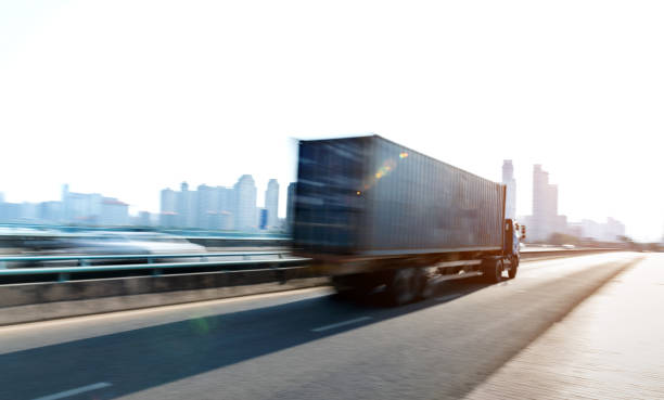 istock Truck speeding on city viaduct 1237542342