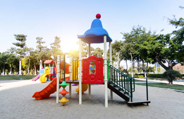 Colorful slides in the sand pool Colorful slides in the sand pool. jungle gym stock pictures, royalty-free photos & images