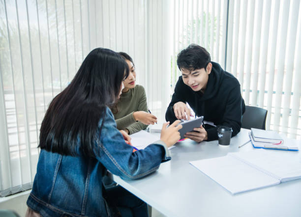 istock Asian students read books and use digital tablets to find information for work and online studies 1237592484
