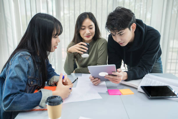 istock Asian students read books and use digital tablets to find information for work and online studies 1237593018