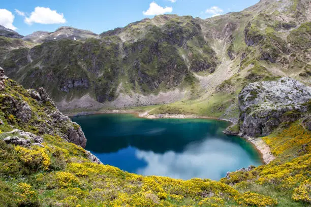 Calabazosa or Black deep mountain lake in the Somiedo national park, Spain, Asturias. Saliencia mountain lakes. Dark blue water.