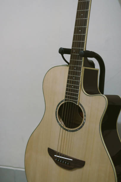 istock Close up acoustic guitar on stand 1237667870